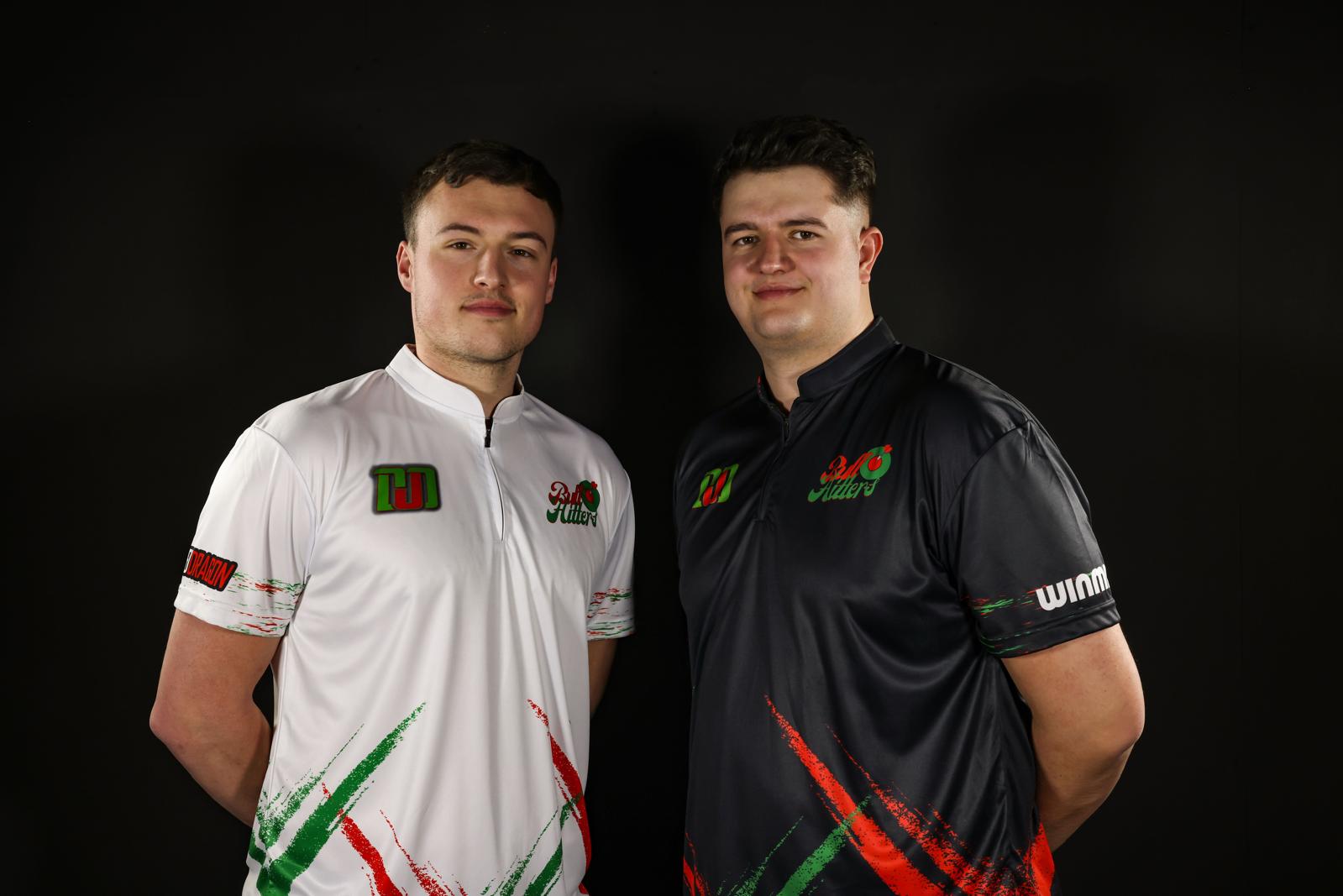 Two BullHitters creators in studio team shirts